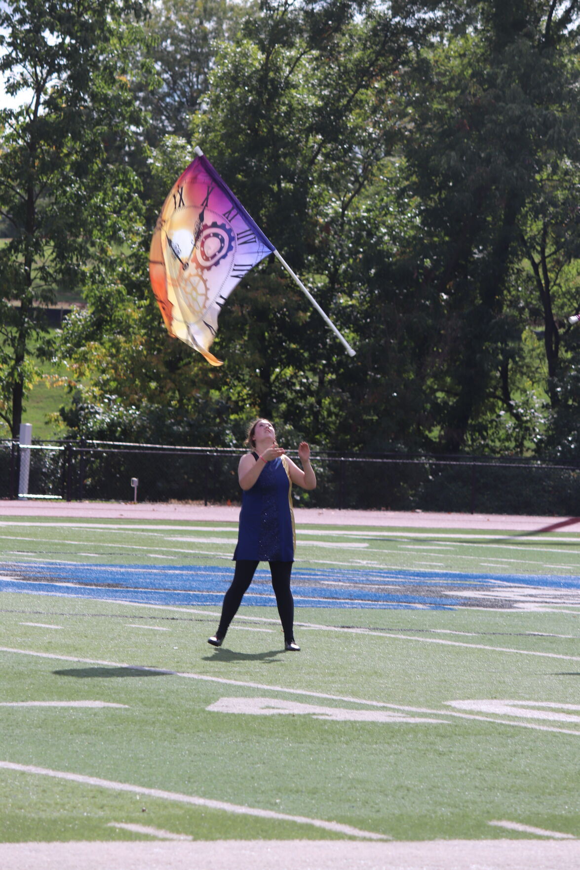 Mollie Ferguson tosses her flag